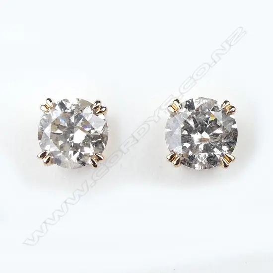 A pair of 18ct rose gold diamond stud earrings