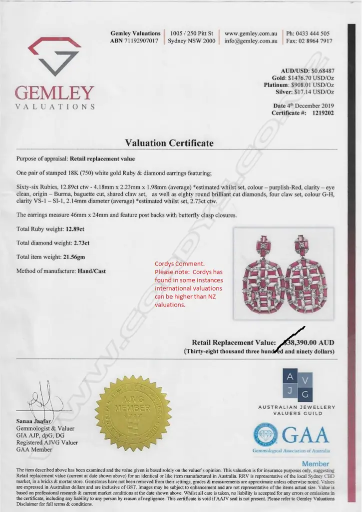 A pair of 18ct white gold ruby and diamond earrings Image 1++