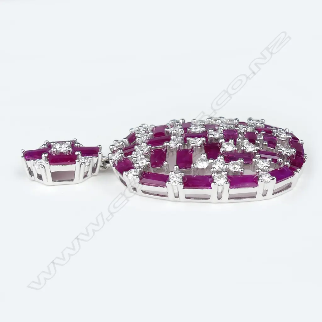 A pair of 18ct white gold ruby and diamond earrings Image 1++