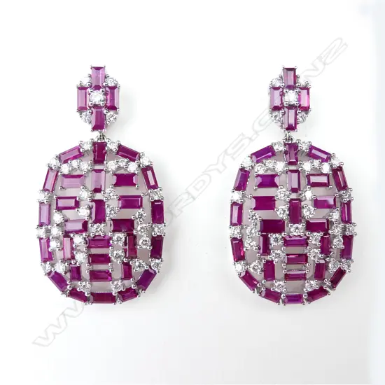 A pair of 18ct white gold ruby and diamond earrings