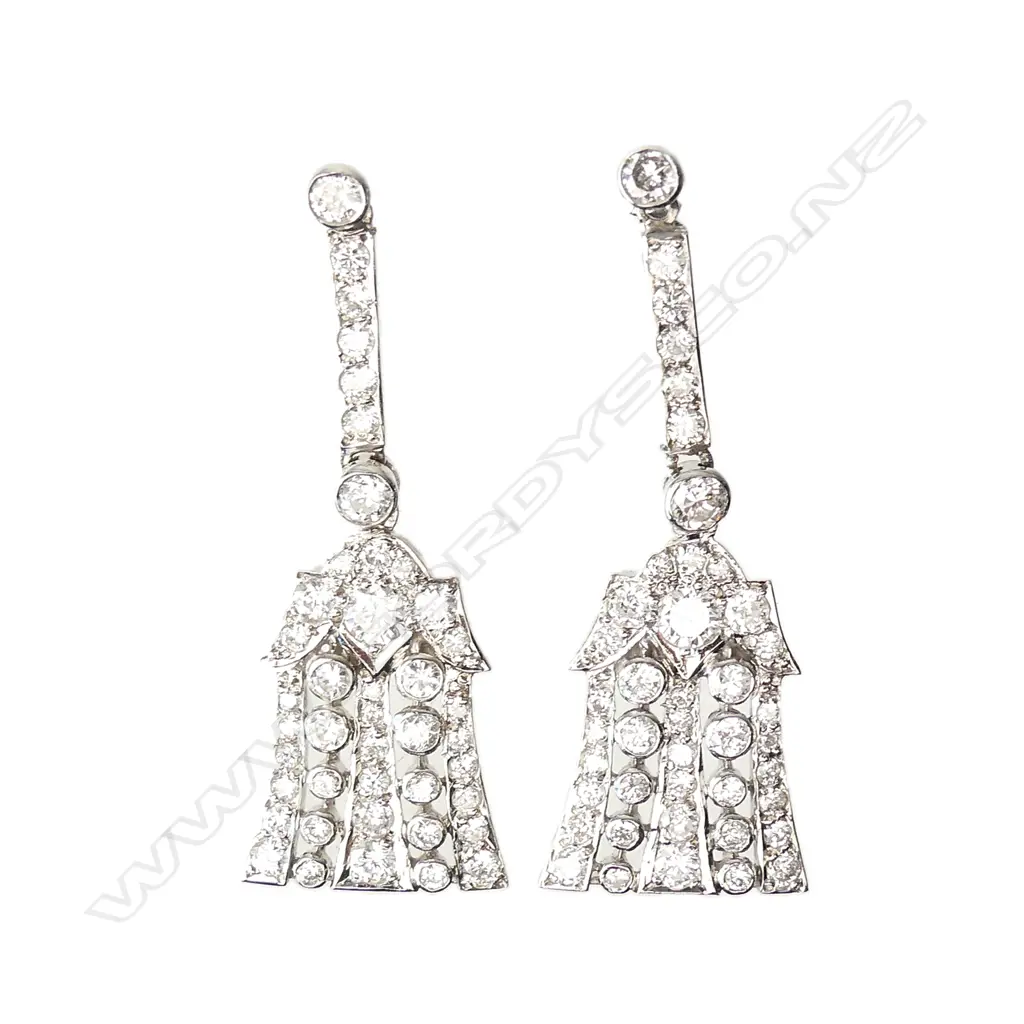 A pair of 18ct white gold and diamond drop earrings Image 1++