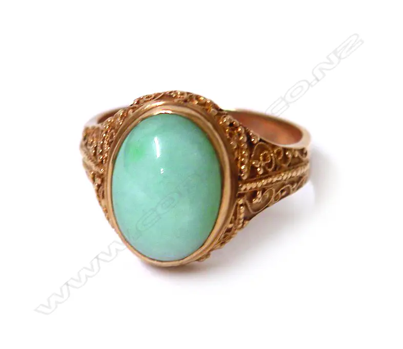 A 14ct. gold and jadeite dress ring Image 1++