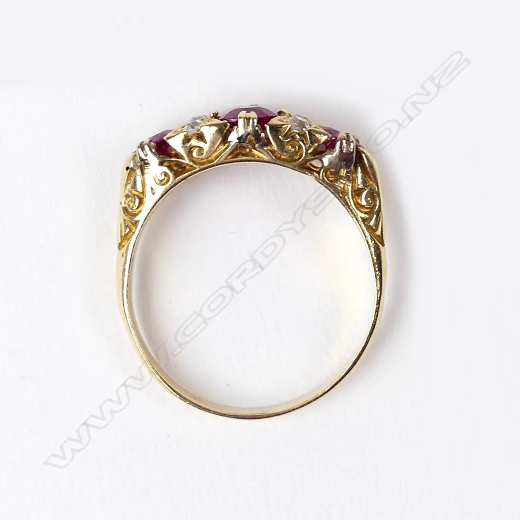 A vintage 18ct diamond and faux ruby ring Image 1++