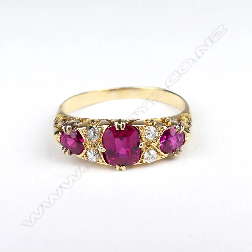 A vintage 18ct diamond and faux ruby ring Image 1++