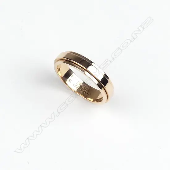 A modern Piaget 18ct. rose gold band ring