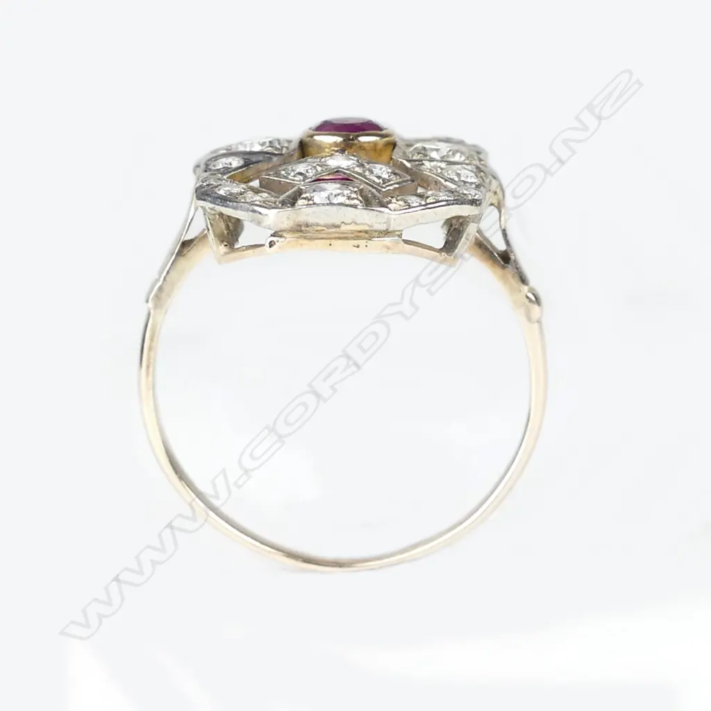 An Art Deco 9ct gold and silver diamond and ruby ring Image 1++