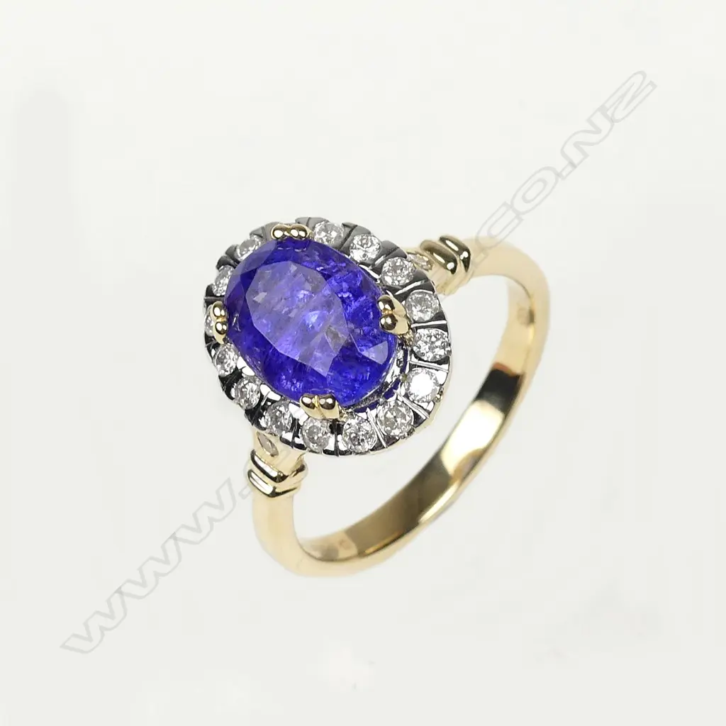 A 14ct gold tanzanite and diamond ring Image 1++