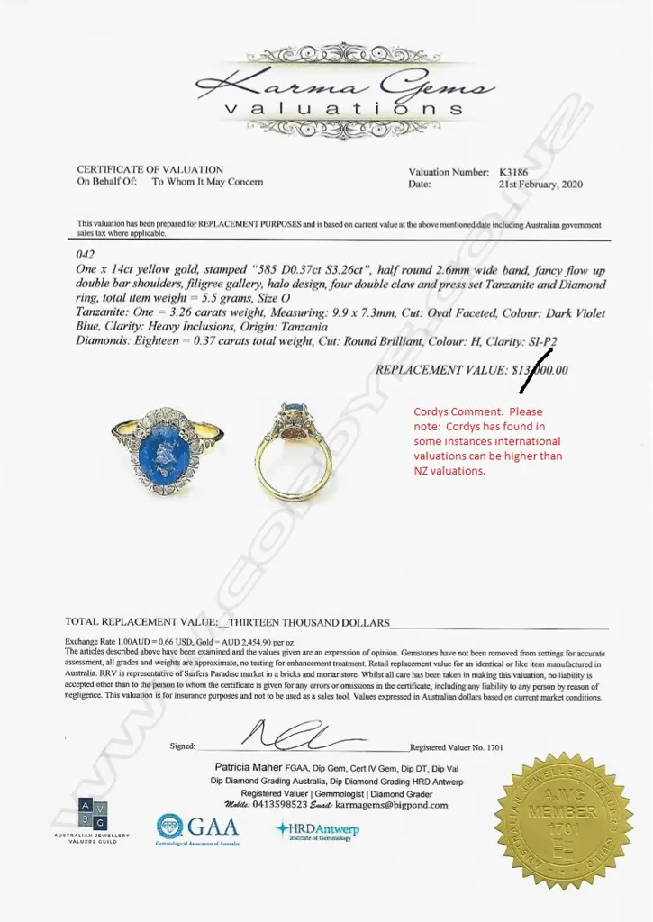 A 14ct gold tanzanite and diamond ring Image 1++