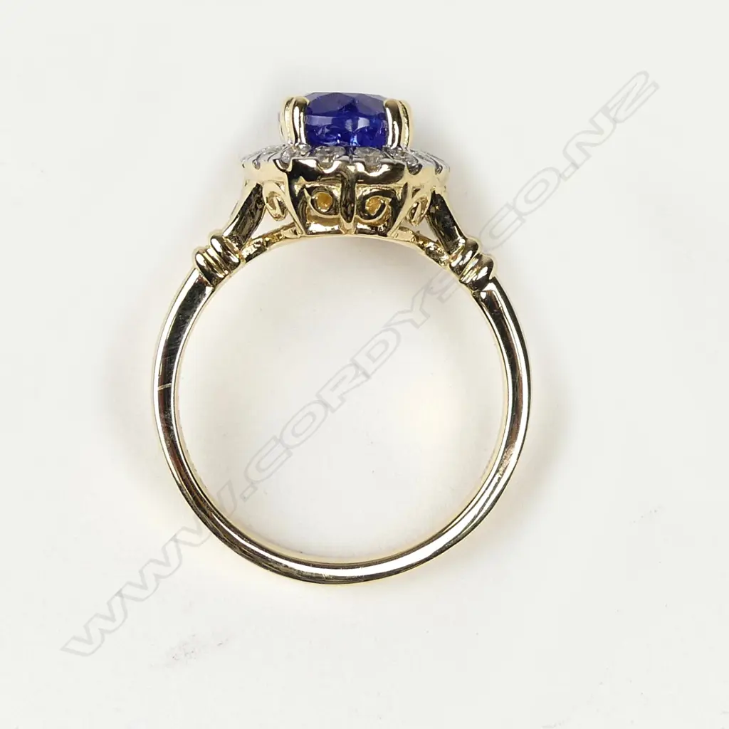 A 14ct gold tanzanite and diamond ring Image 1++