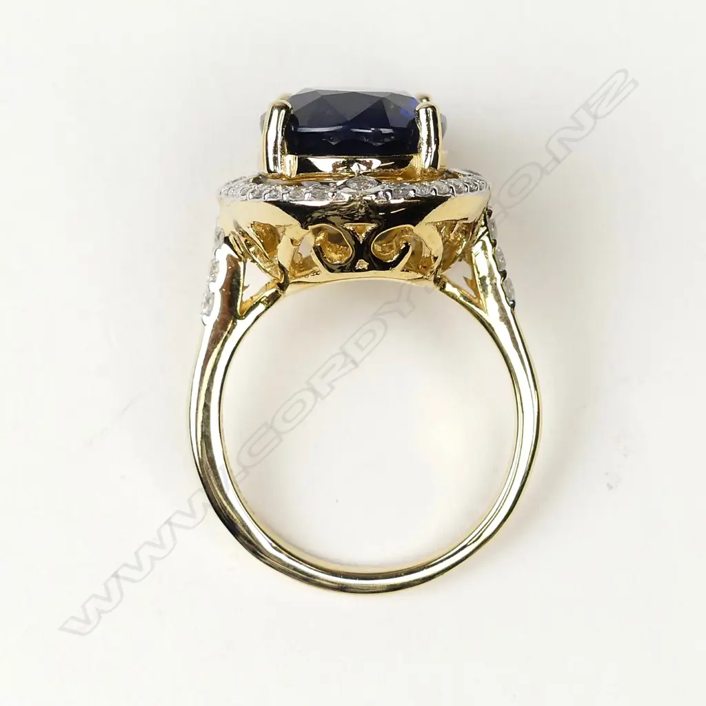 A 14ct gold 9.83ct sapphire and diamond ring Image 1++