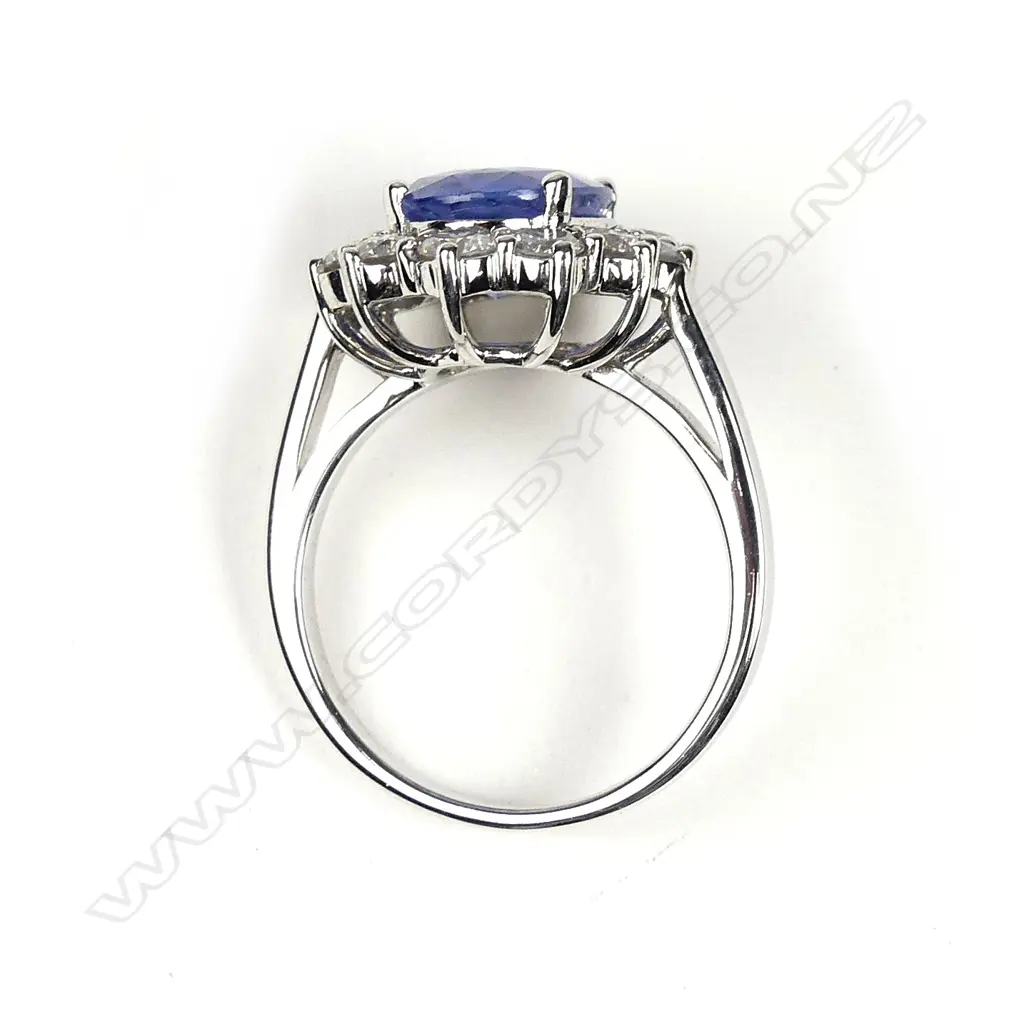 A 14ct white gold sapphire and diamond ring Image 1++