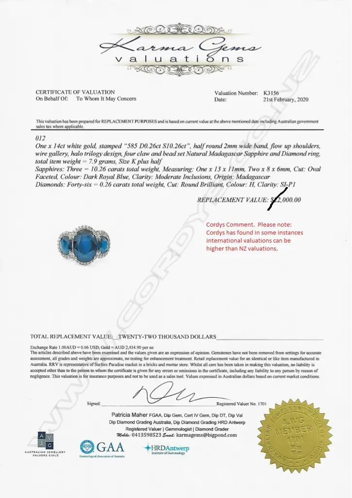 A 14ct white gold sapphire and diamond trilogy ring Image 1++