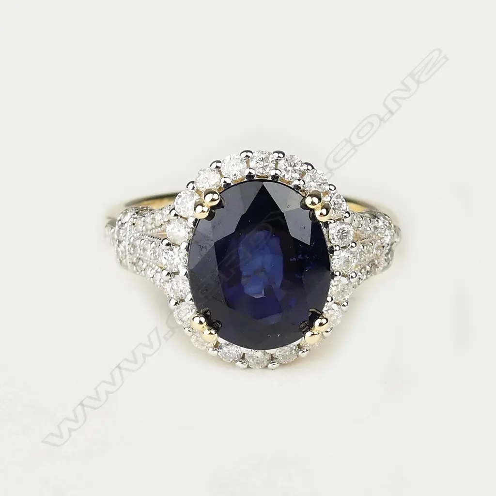 A 14c gold sapphire and diamond ring Image 1++