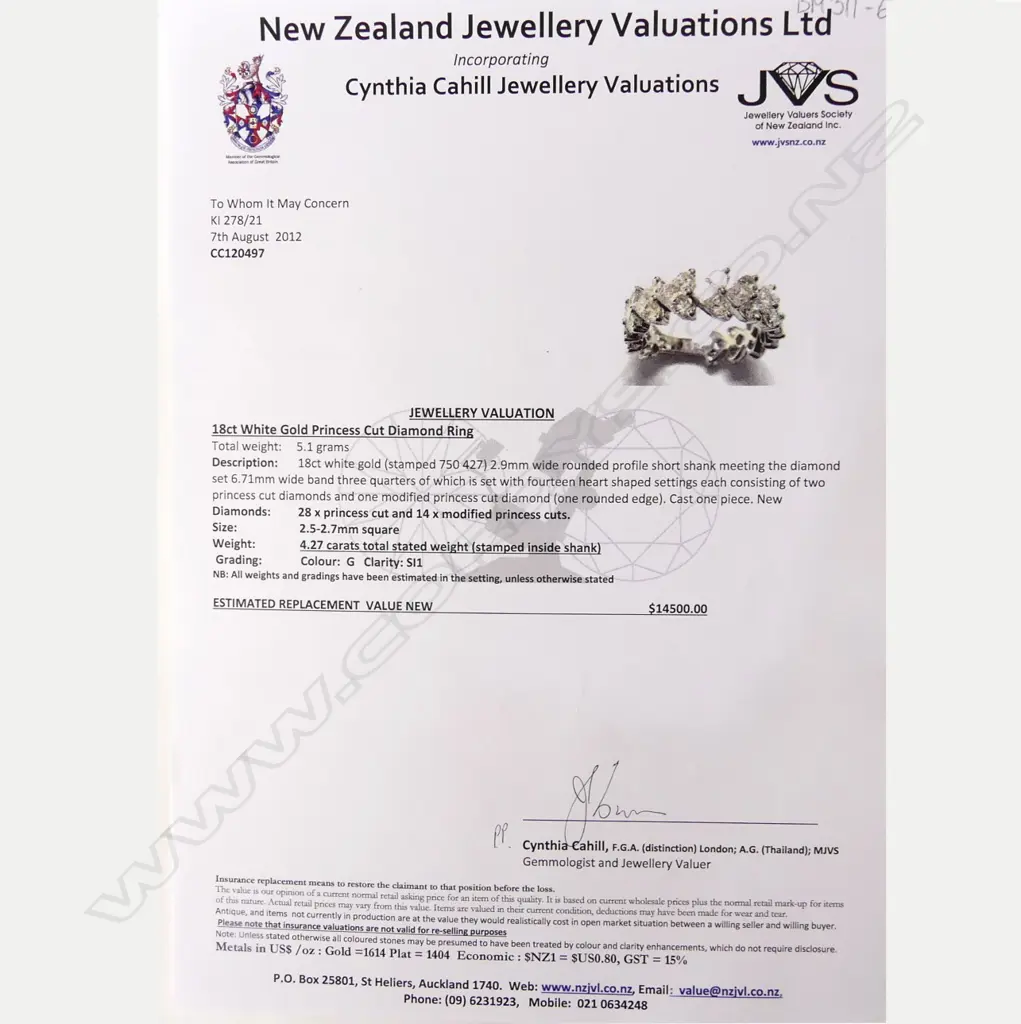 An 18ct white gold and diamond eternity band Image 1++