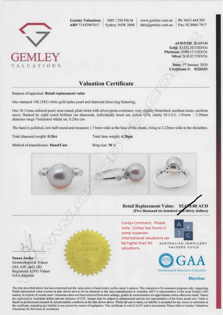 A 14ct white gold pearl and diamond ring Image 1++