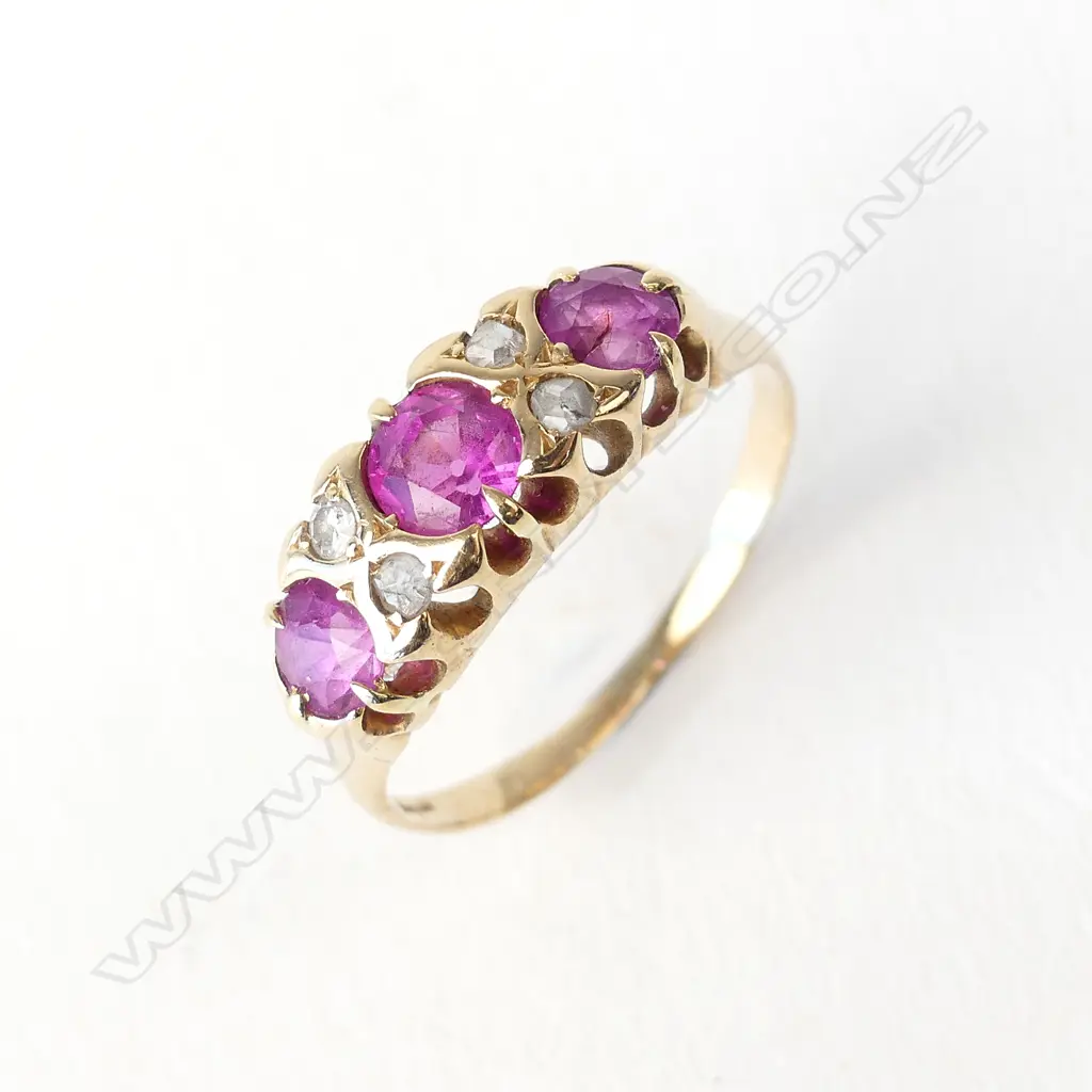 An 18ct gold pink sapphire and diamond ring Image 1++