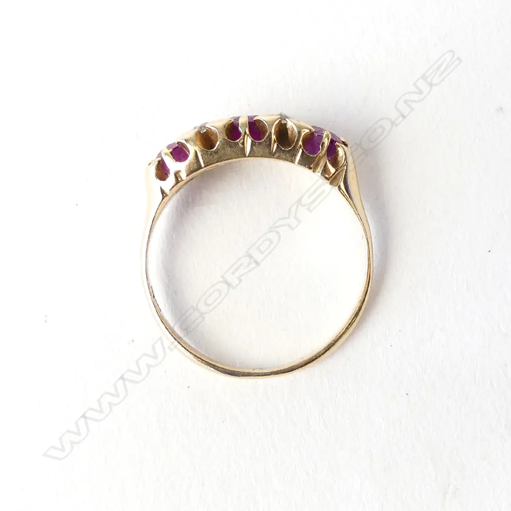 An 18ct gold pink sapphire and diamond ring Image 1++