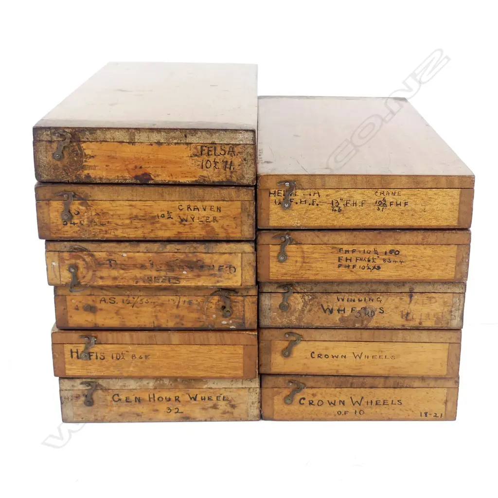 Eleven boxes of watchmakers' parts Image 1++