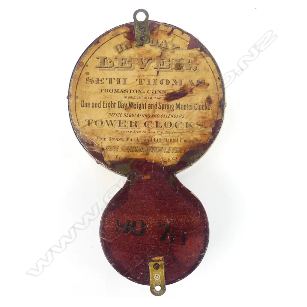 An American Seth Thomas circular ships clock striking on an exposed bell Image 1++