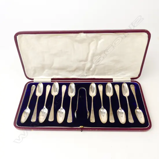 A cased set of twelve Edwardian silver coffee spoons and sugar tongs