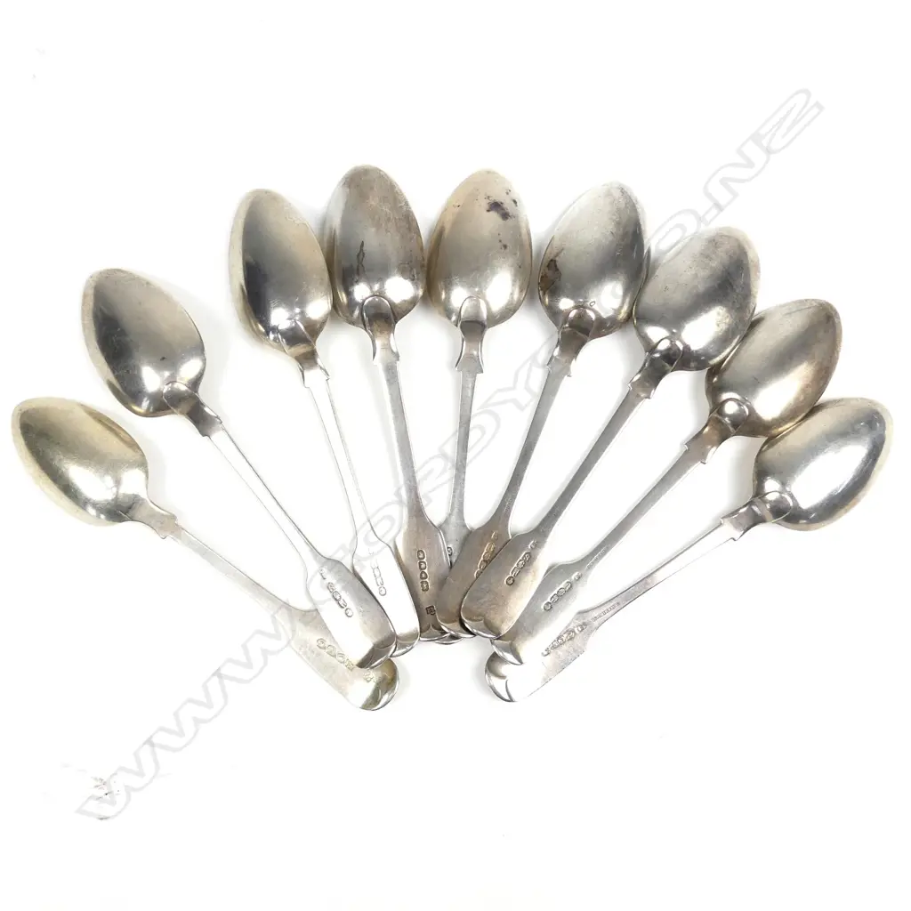 Nine Victorian silver dessert spoons Image 1++