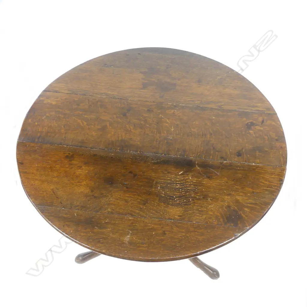 An oak tilt-top wine table Image 1++
