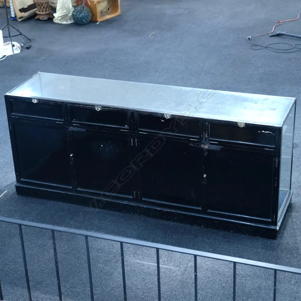 An early 20thC ebonised frame shop display counter Image 1++