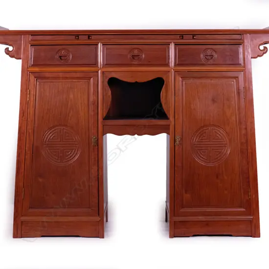 A Chinese rosewood sideboard