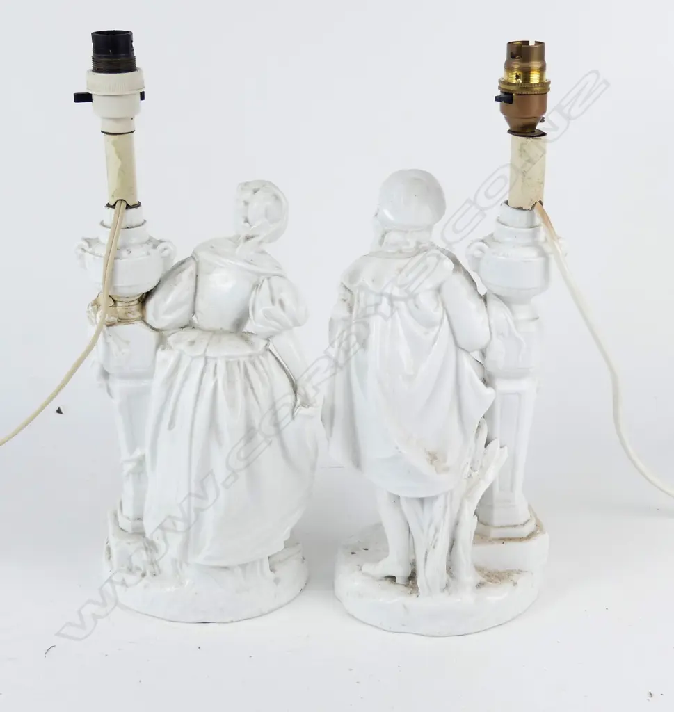 A pair of 19thC French white porcelain table lamps Image 1++
