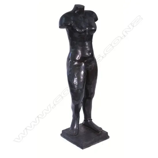 A bronze standing female torso