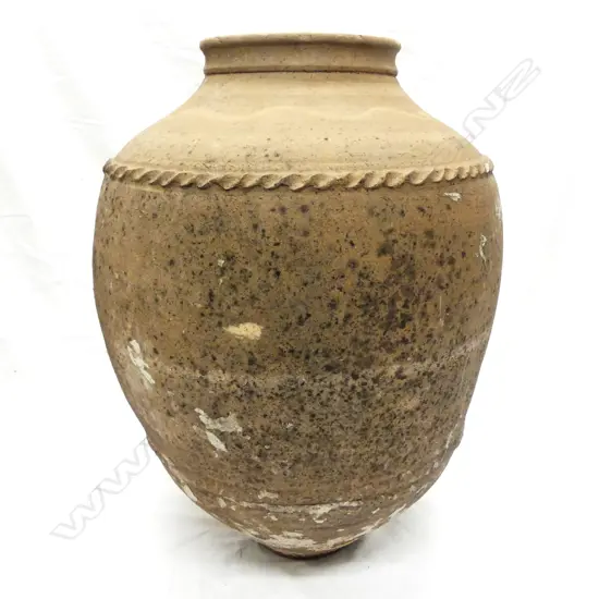 An old Turkish terracotta tall storage jar