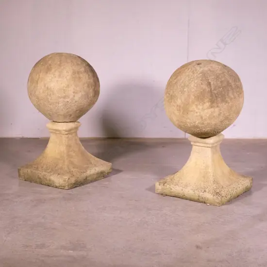 A pair of classical Church Stone gateway ball piers