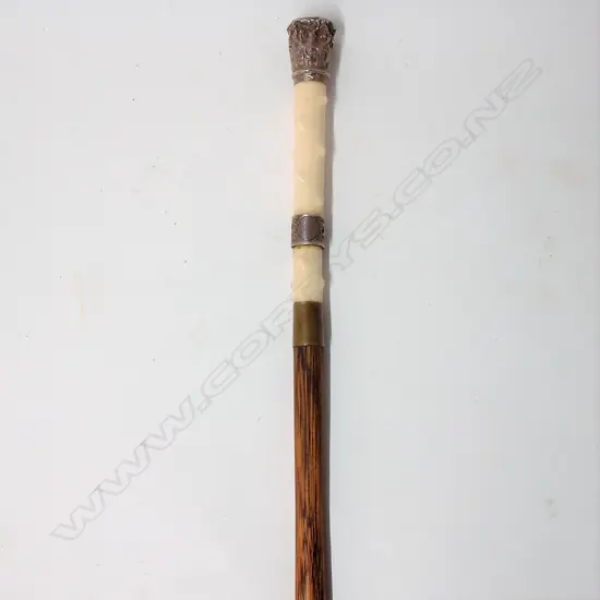 A c.1900 ivory and silver handled malacca cane walking stick