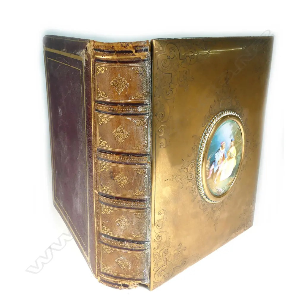 A 19thC photograph album with Sevres style porcelain panel to the cover Image 1++
