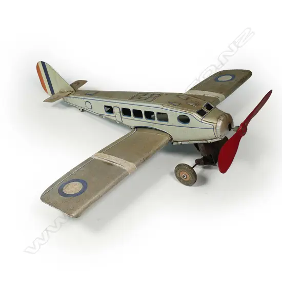 A mid-20thC British toy tin plate clockwork plane