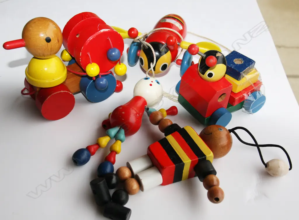Collection of 5 wooden pull along toys including Buzzy Bee Image 1++