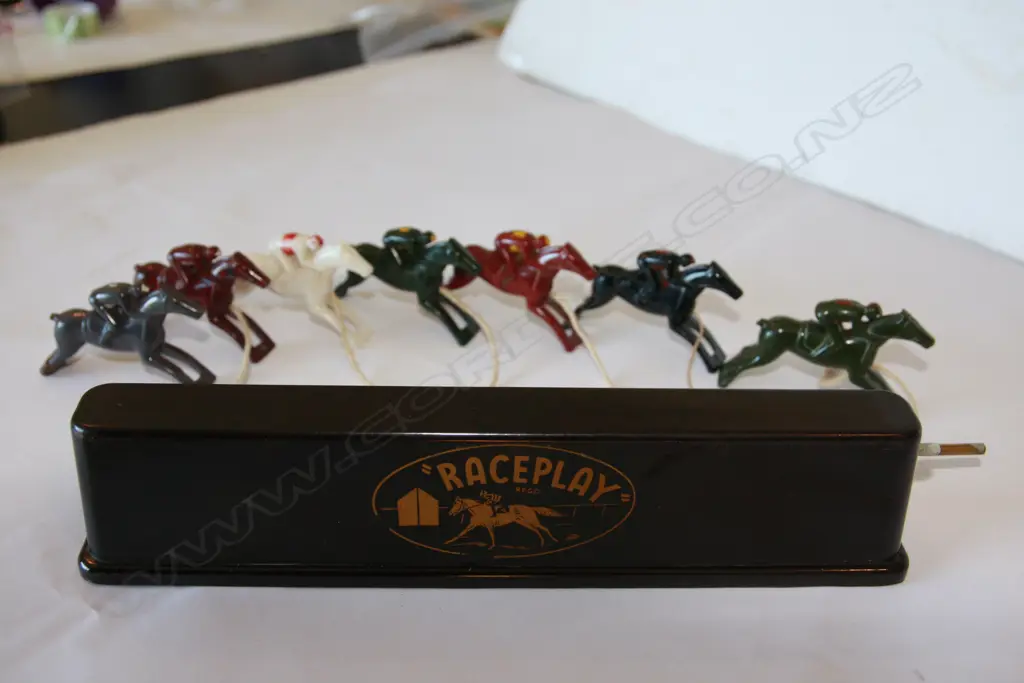 ‘Raceplay’ rare early Bakelite plastic race game featuring ‘Phar Lap’and other famous period racehorses. Wind Up game similar to ‘Escalado Image 1++