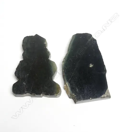 Two greenstone slabs