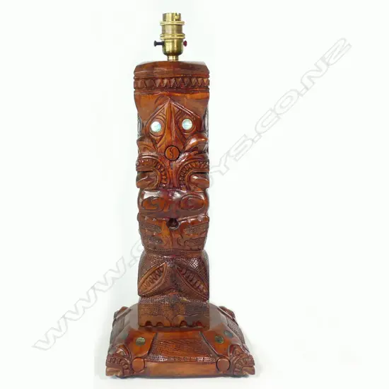 A vintage Maori figure carved table lamp base