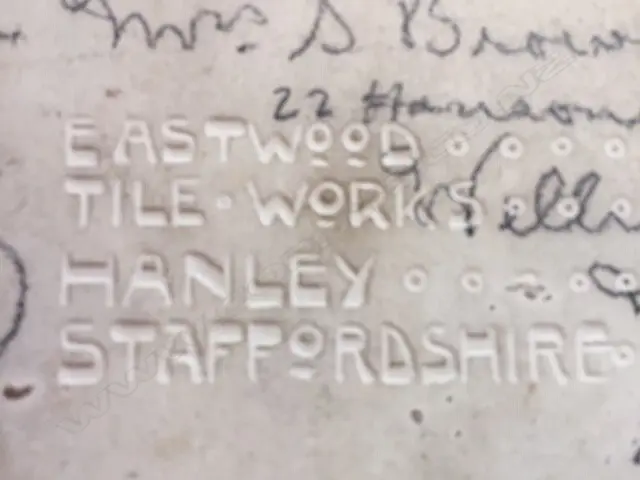 A c.1900 Sherwin & Cotton Māori portrait tile of the chief 'Matene Te Nga', depicted with full moko and in a korowai (cloak), the chief of Ngati Maru iwi, entitled top left, the artist George Cartlidge’s monogram bottom right, maker's marks to reverse. 225 x 150mm.Professional restoration, in old rewarewa frame, the reverse with outline and starting of Māori carved detail. Image 1++