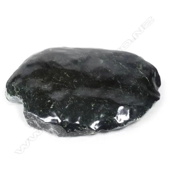 A impressive large dark green 50kg pounamu boulder