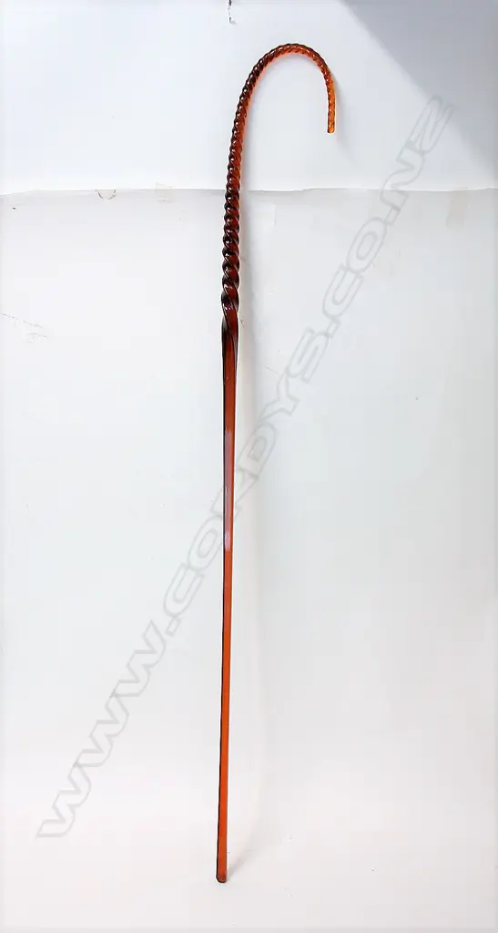 A Victorian amber glass walking cane Image 1++