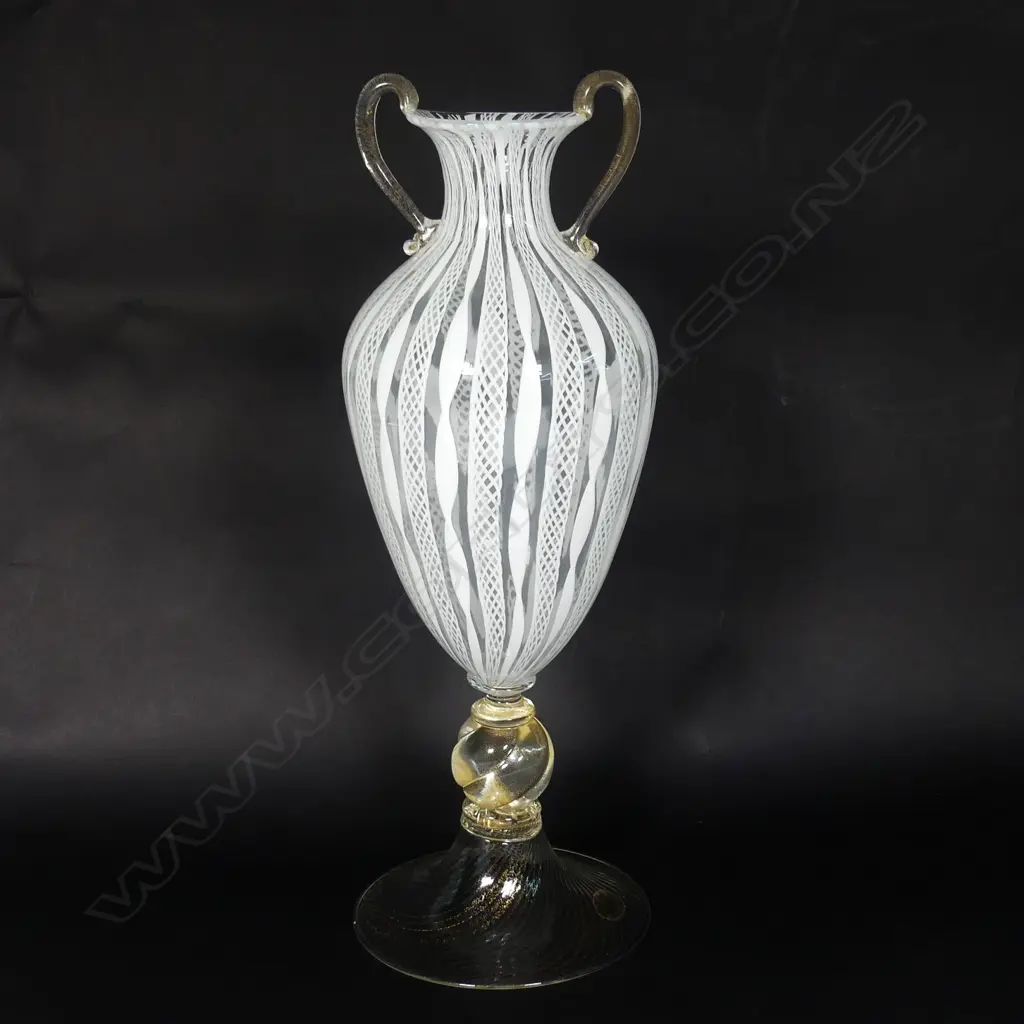 A Murano glass vase with white latticino and twisted ribbons Image 1++