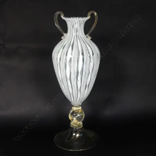 A Murano glass vase with white latticino and twisted ribbons
