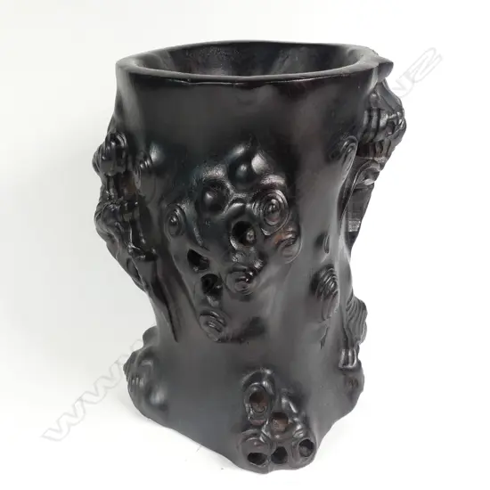 A dense blackwood brushpot