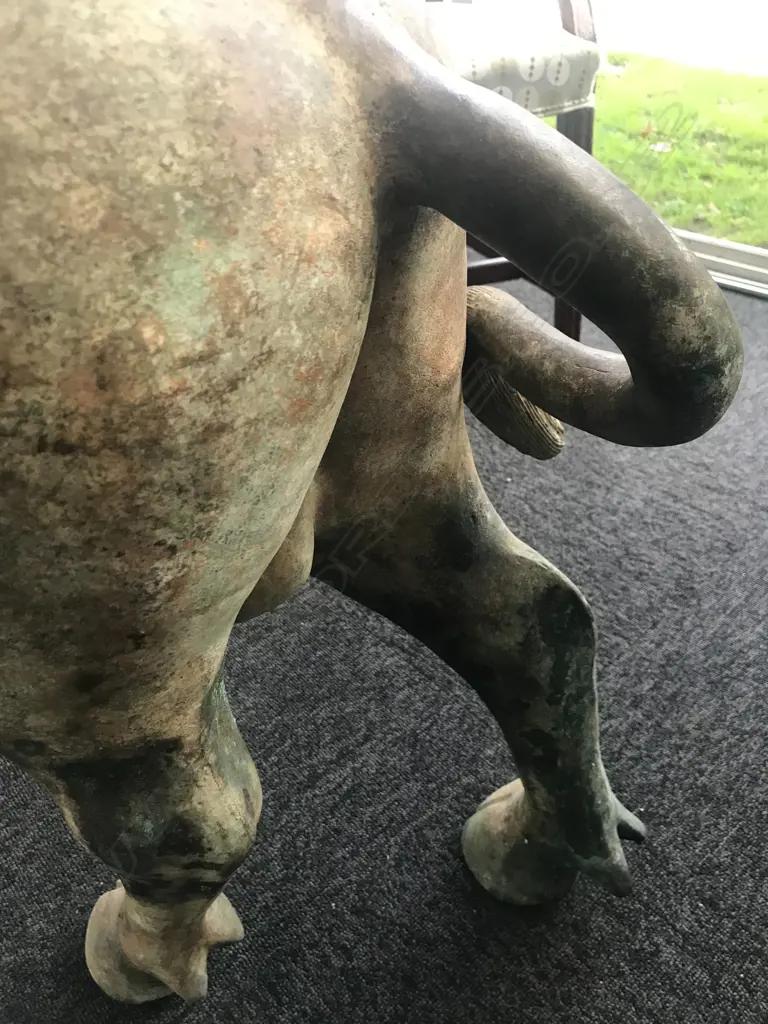 An old and well modelled bronze statue depicting the Zen Buddhist expression of spirit - Riding the Bull Home Image 1++