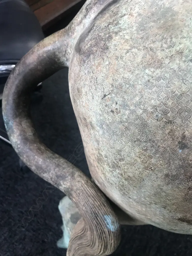 An old and well modelled bronze statue depicting the Zen Buddhist expression of spirit - Riding the Bull Home Image 1++