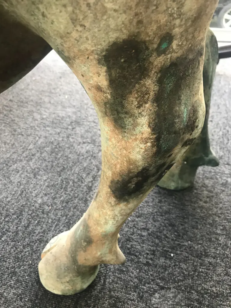 An old and well modelled bronze statue depicting the Zen Buddhist expression of spirit - Riding the Bull Home Image 1++