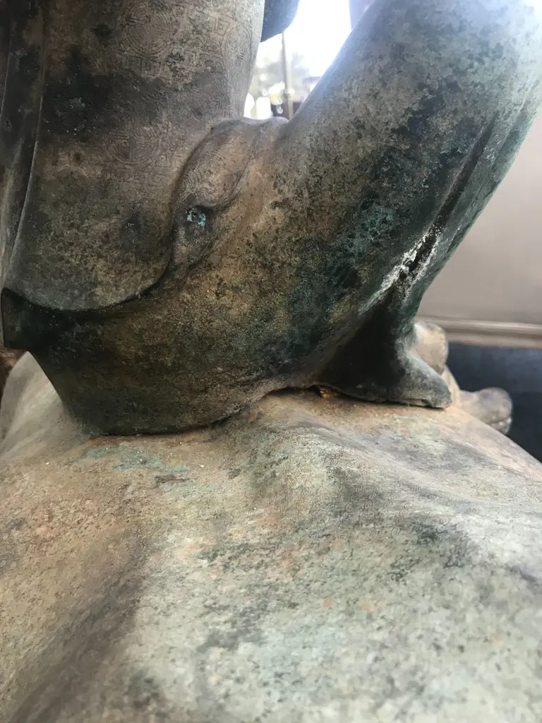 An old and well modelled bronze statue depicting the Zen Buddhist expression of spirit - Riding the Bull Home Image 1++