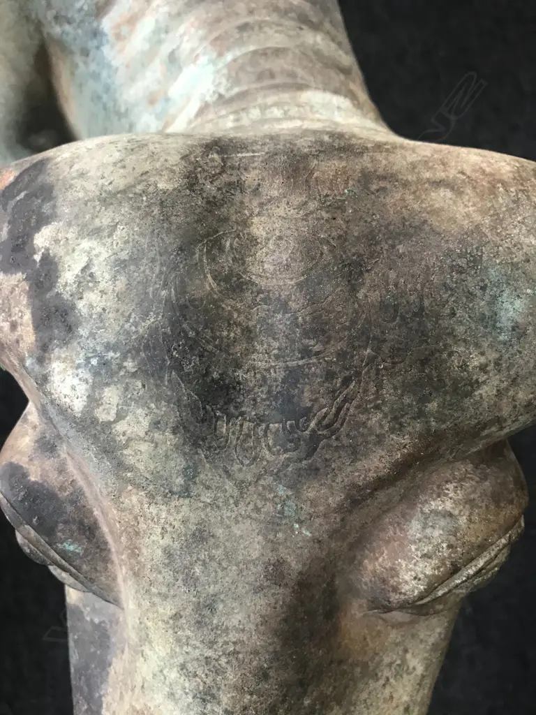 An old and well modelled bronze statue depicting the Zen Buddhist expression of spirit - Riding the Bull Home Image 1++